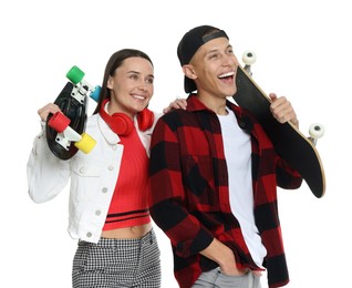 Photo of Happy friends with skateboards on white background