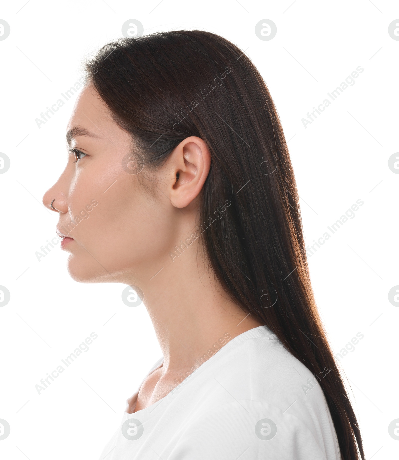 Photo of Profile of young woman with beautiful nose on white background