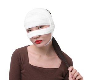 Photo of Woman with nose wrapped in medical bandage after plastic surgery operation on white background