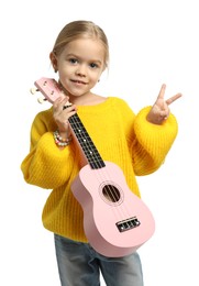 Photo of Little girl with ukulele showing V-sign on white background