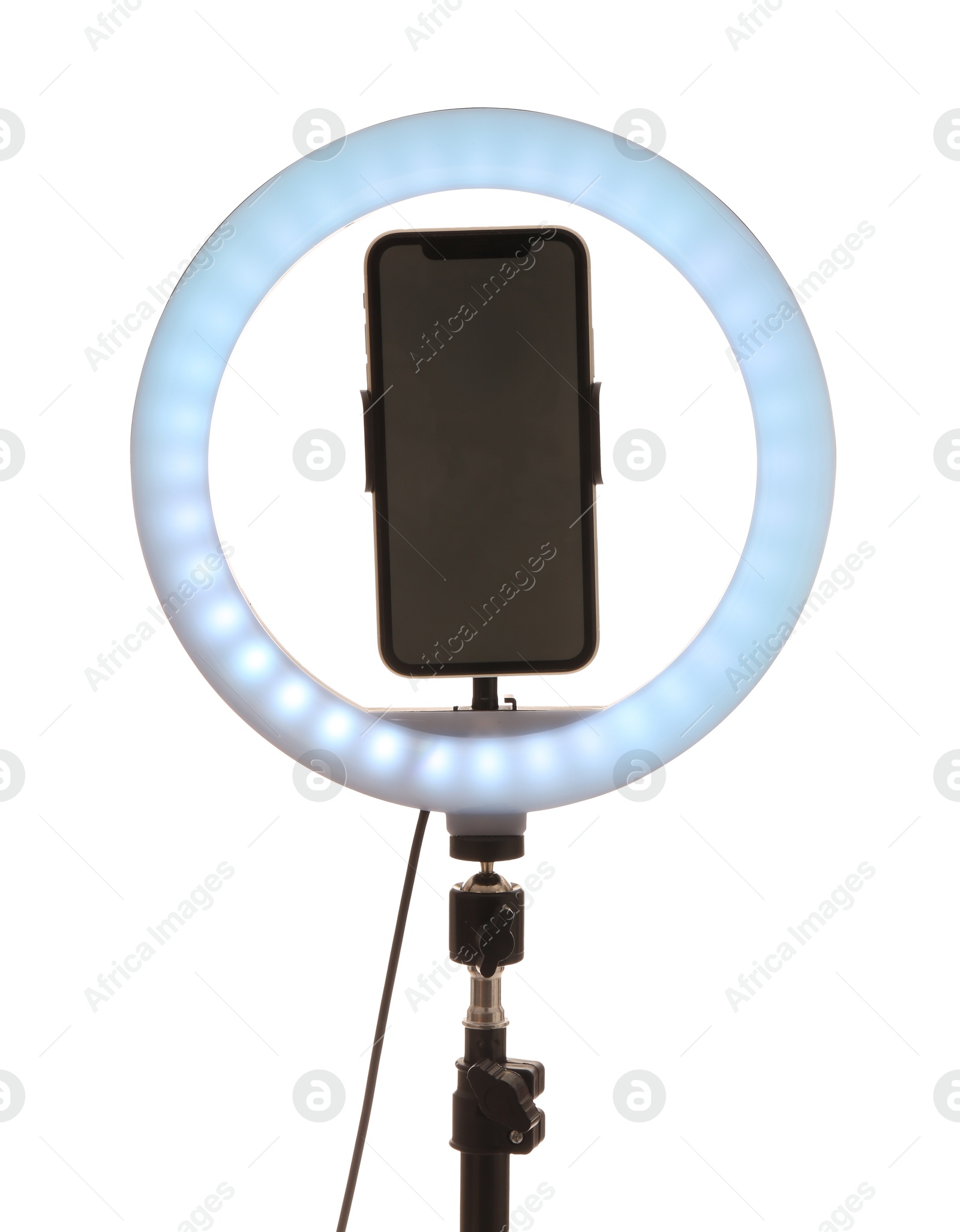 Photo of Tripod with ring light and smartphone isolated on white