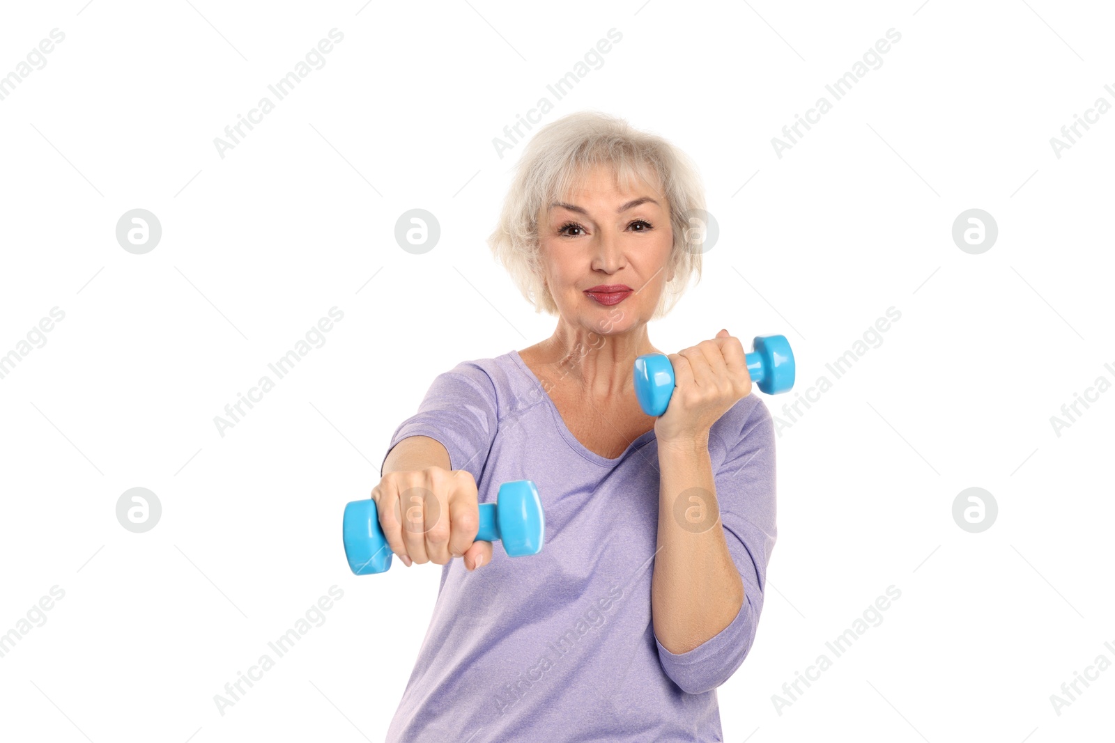 Photo of Senior woman exercising with dumbbells on white background