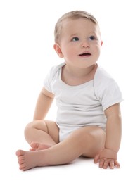 Photo of Cute little baby sitting on white background