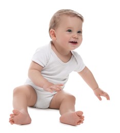 Photo of Cute little baby sitting on white background