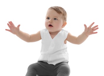 Photo of Cute little baby sitting on white background