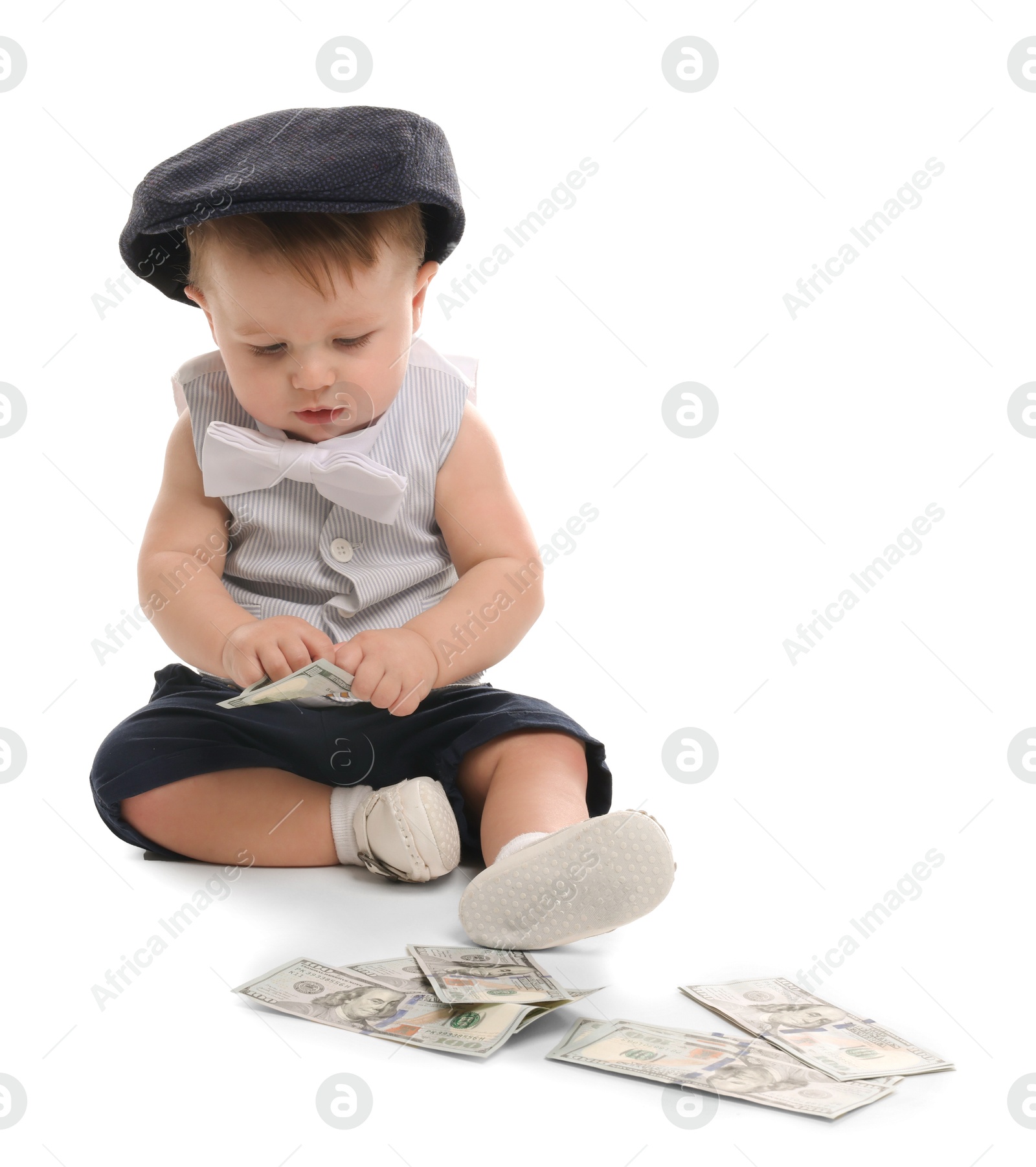 Photo of Little baby with money on white background