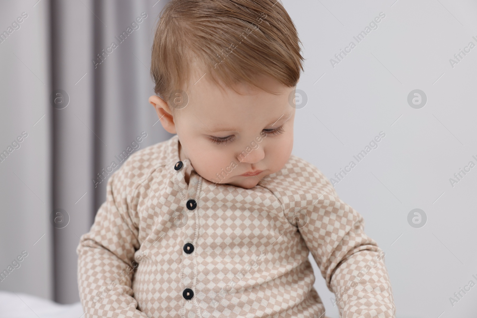 Photo of Portrait of sweet little baby at home