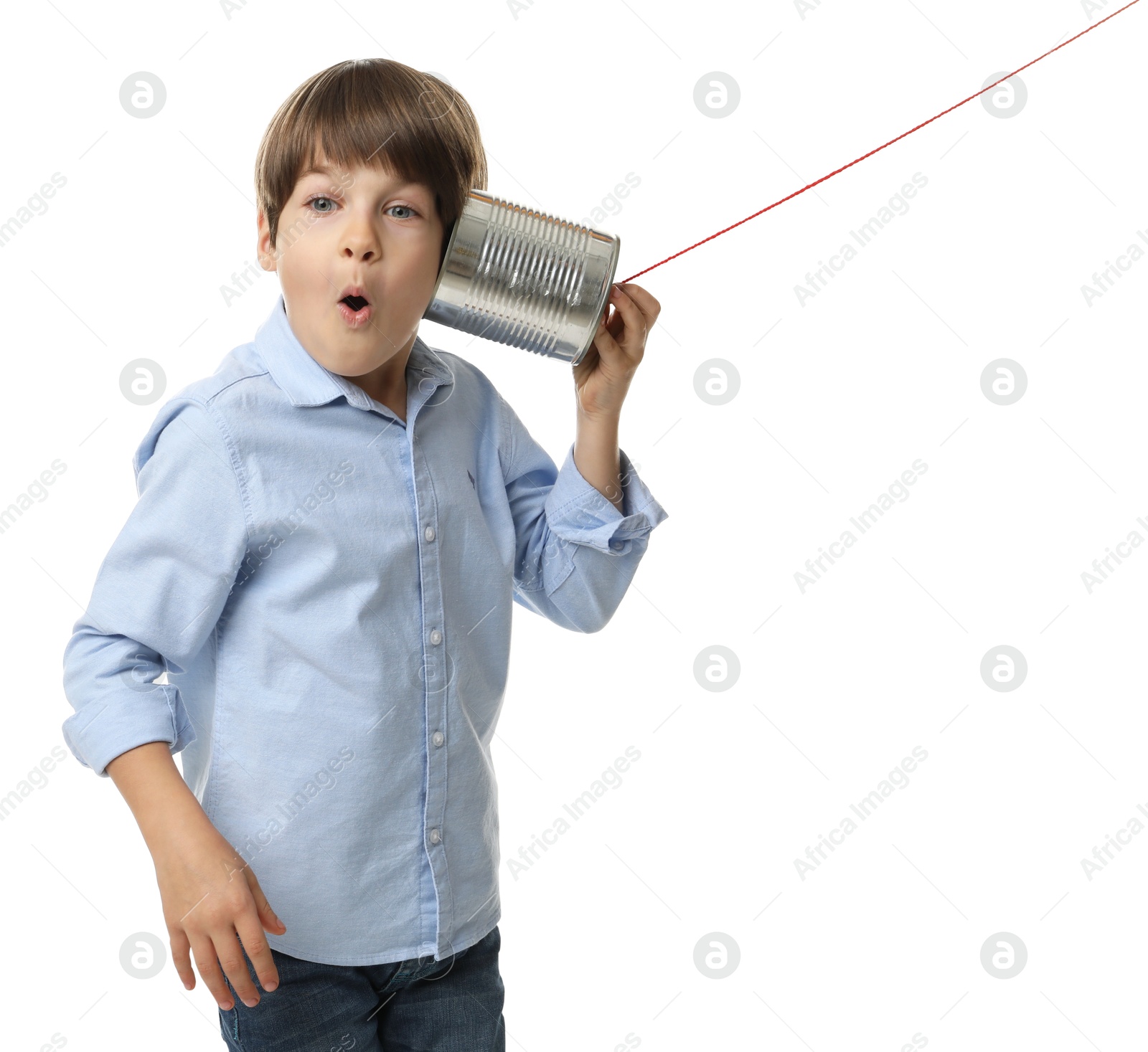 Photo of Boy using tin can telephone on white background