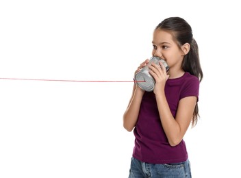 Photo of Girl using tin can telephone on white background