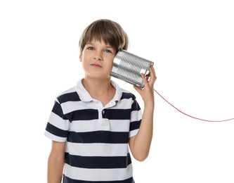 Photo of Boy using tin can telephone on white background