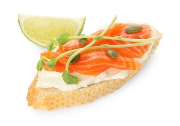 Photo of Delicious bruschetta with cream cheese, salmon and piece of lime isolated on white