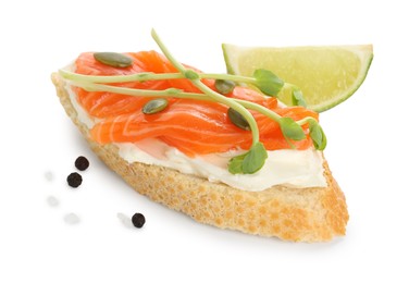 Photo of Delicious bruschetta with cream cheese, salmon and piece of lime isolated on white