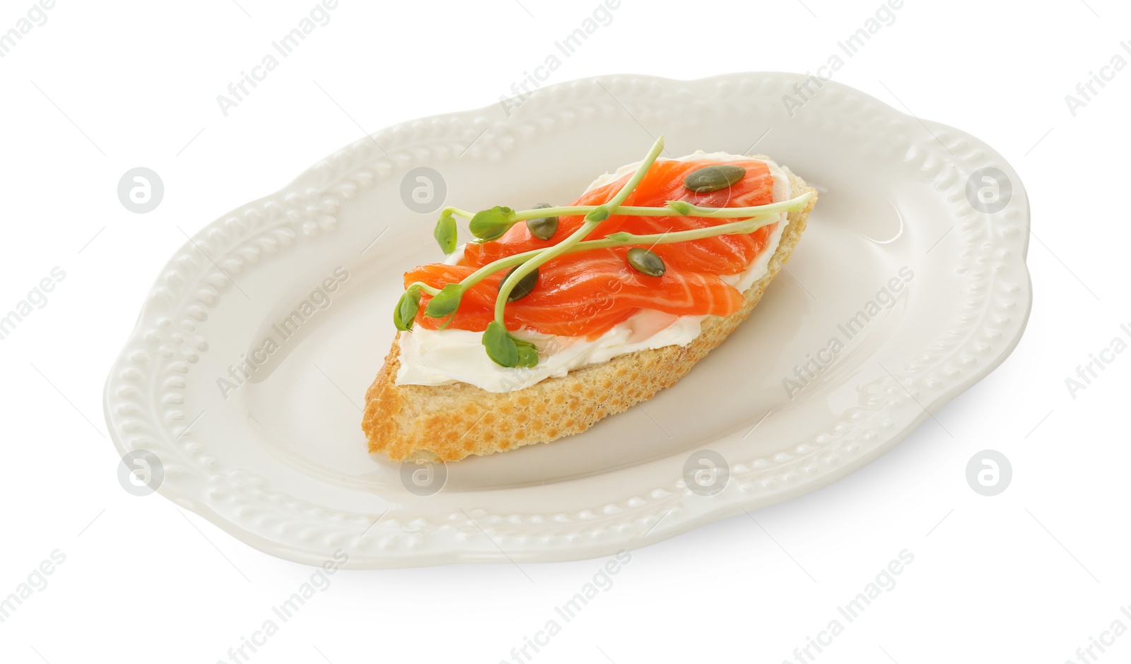 Photo of Delicious bruschetta with cream cheese and salmon isolated on white