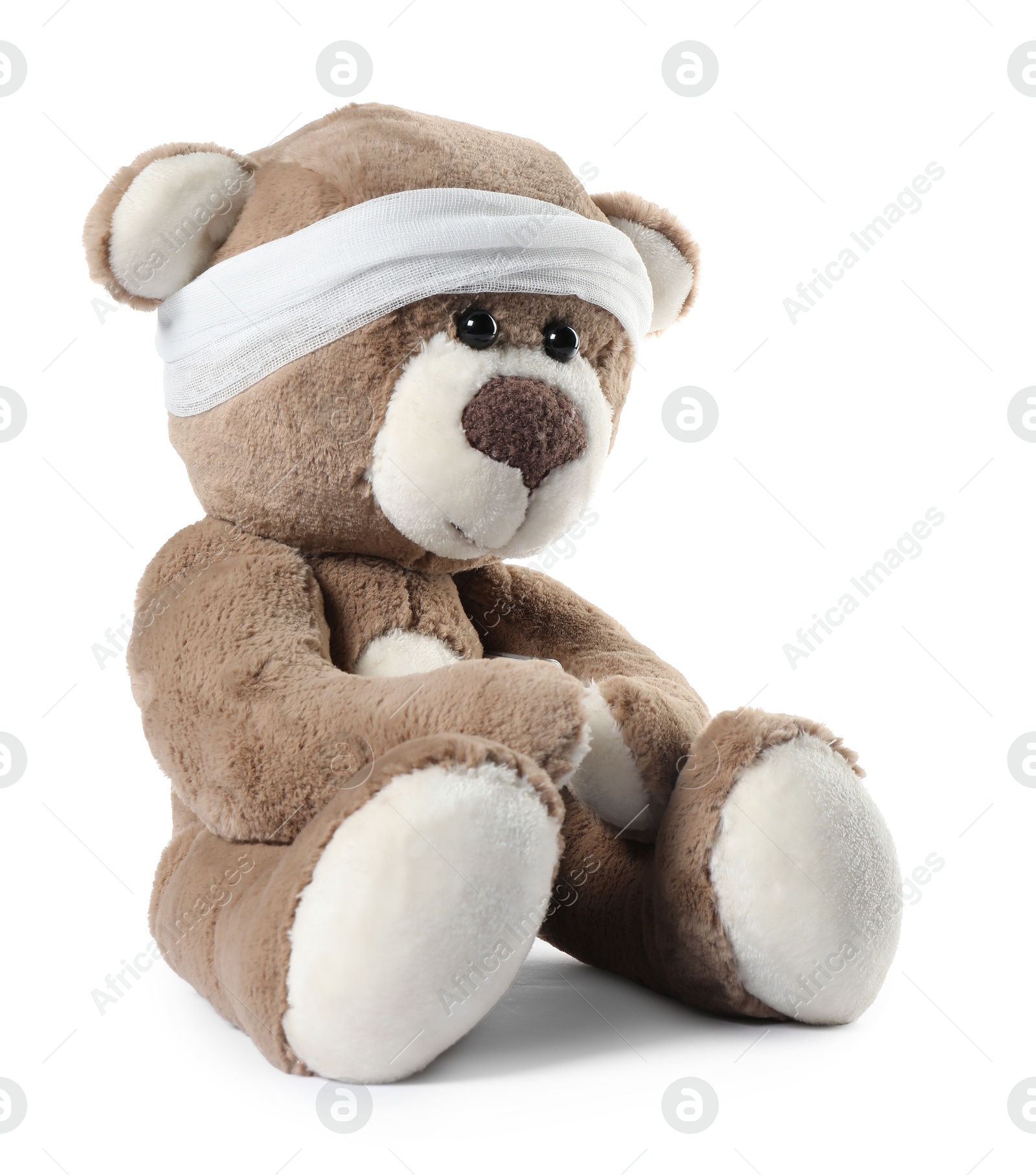 Photo of Teddy bear with bandage isolated on white