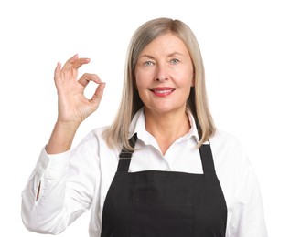 Photo of Senior woman showing okay gesture on white background