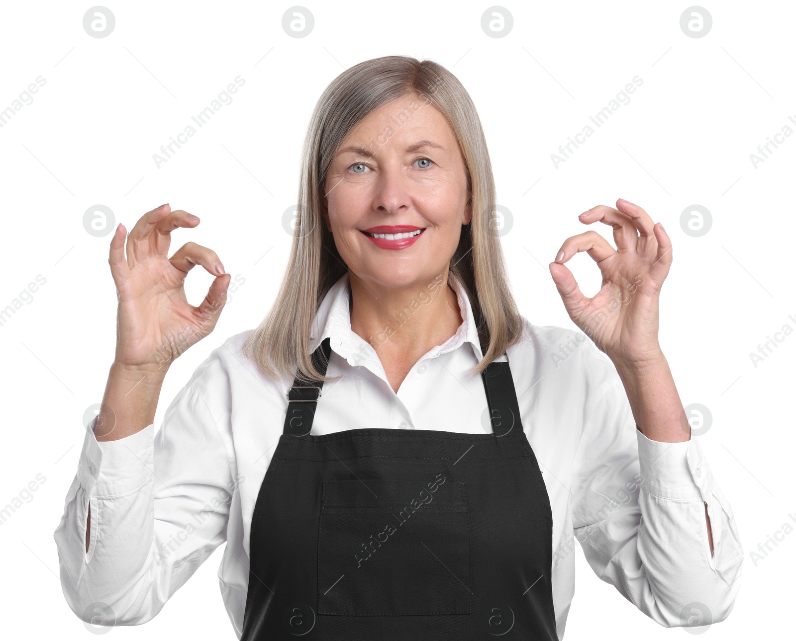 Photo of Senior woman showing okay gesture on white background