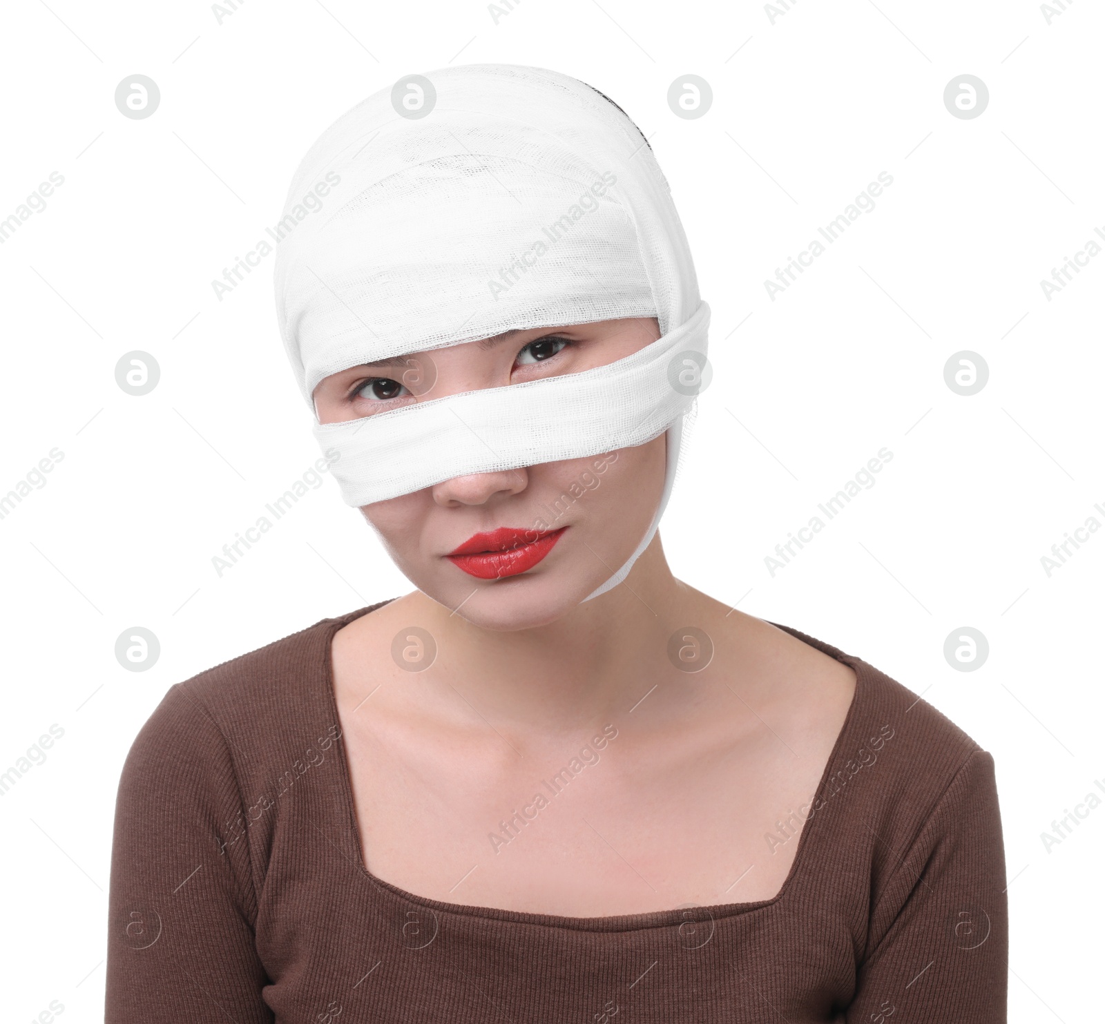 Photo of Woman with nose wrapped in medical bandage after plastic surgery operation on white background