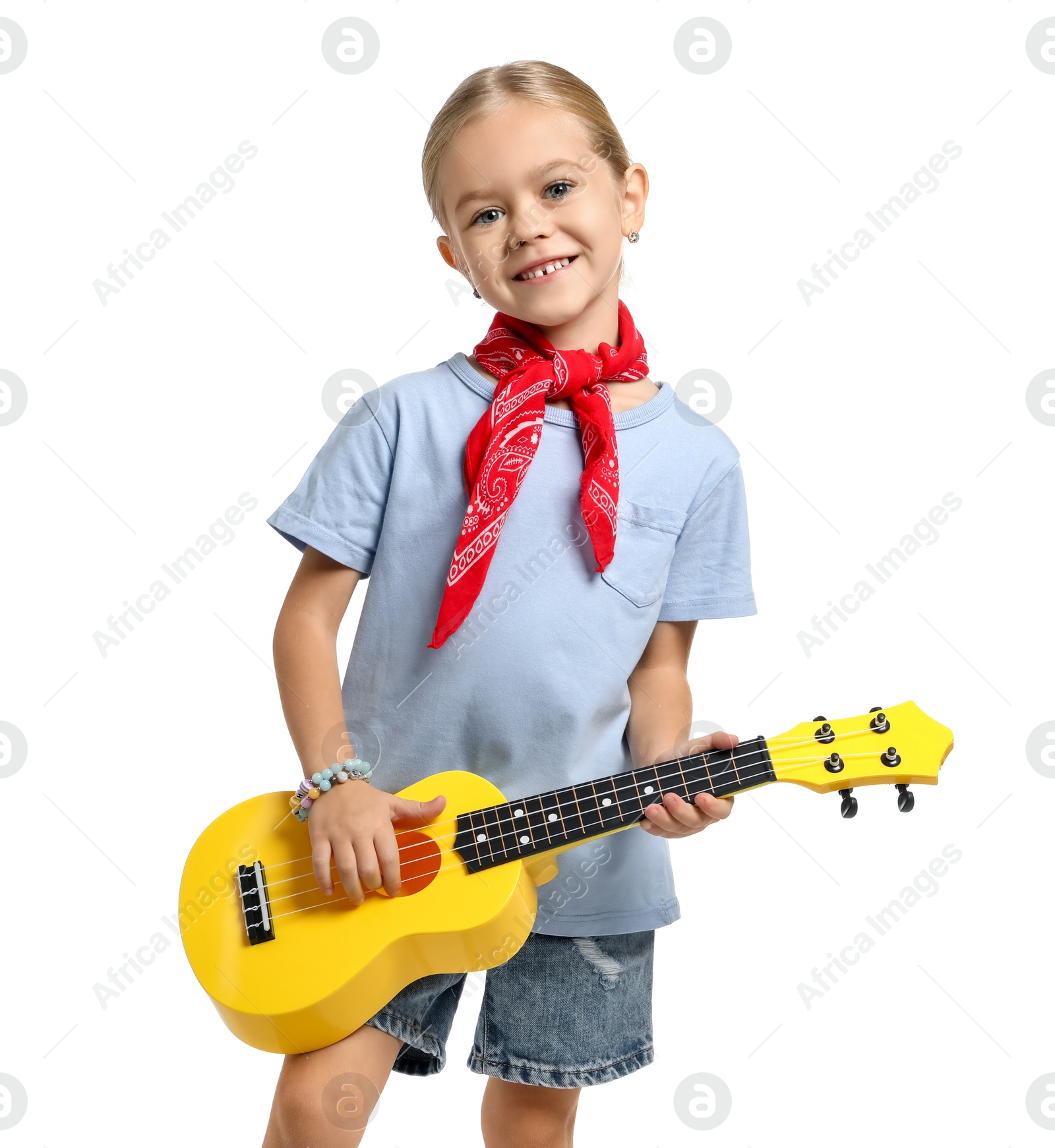 Photo of Little girl playing ukulele on white background