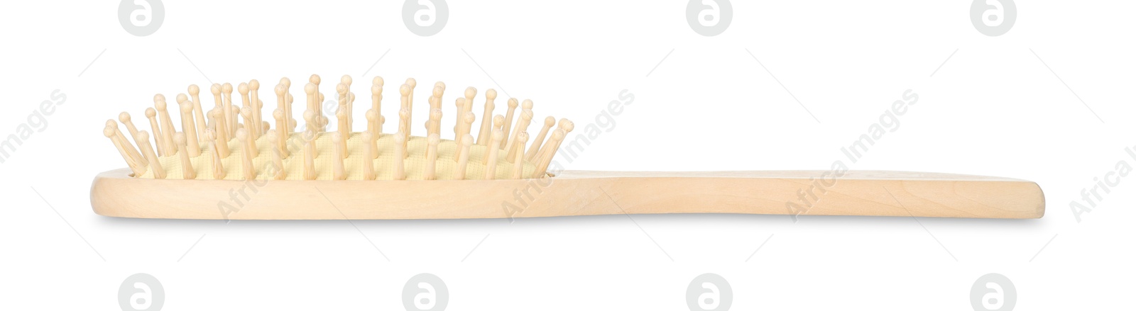 Photo of New wooden hair brush isolated on white