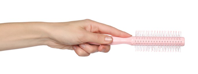 Photo of Woman with round pink hair brush on white background, closeup