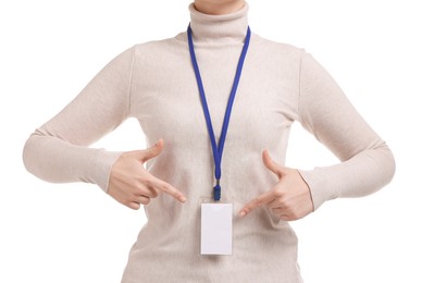 Photo of Woman pointing at her blank badge on white background, closeup