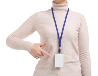 Photo of Woman pointing at her blank badge on white background, closeup