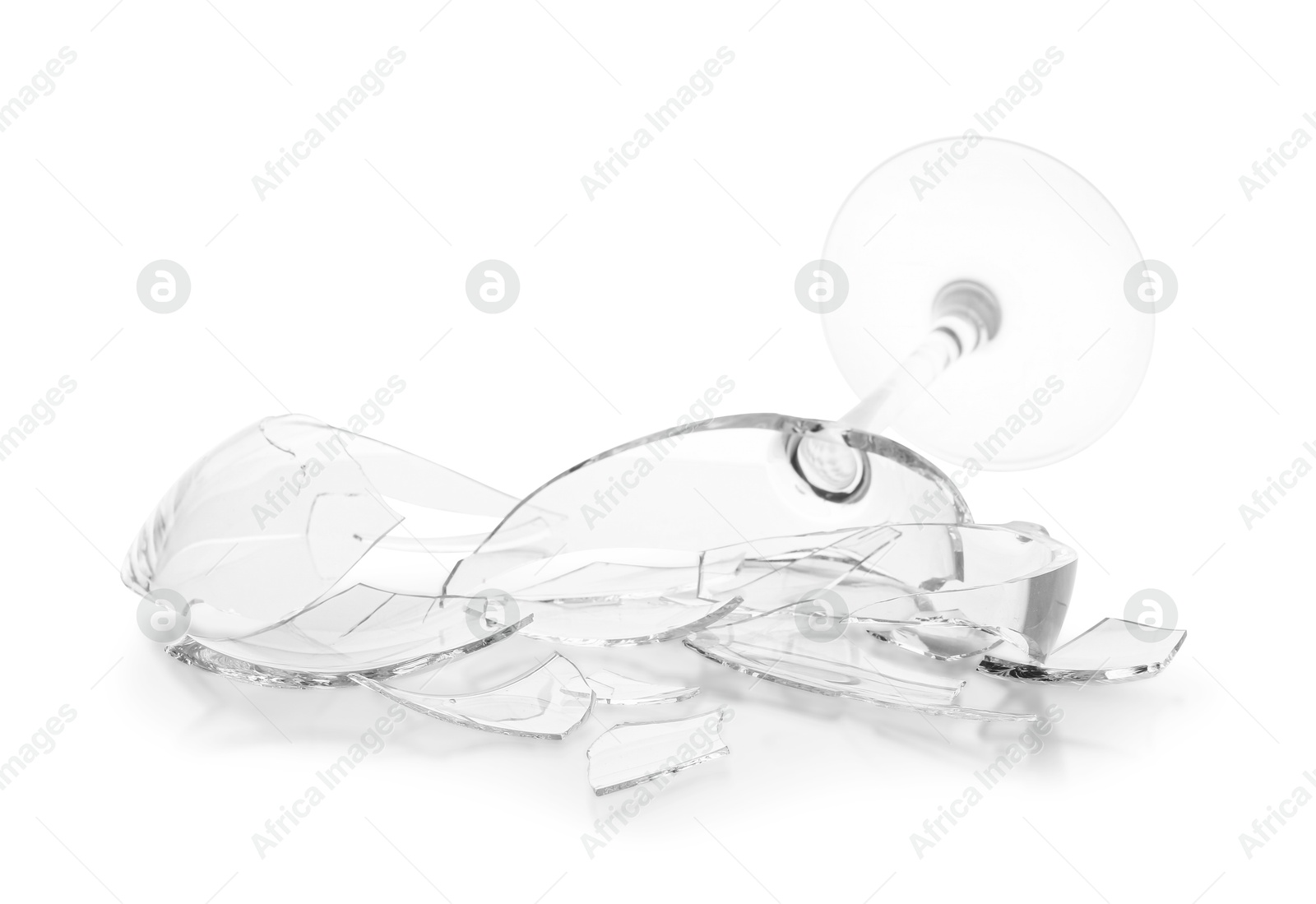 Photo of Pieces of broken wine glass isolated on white