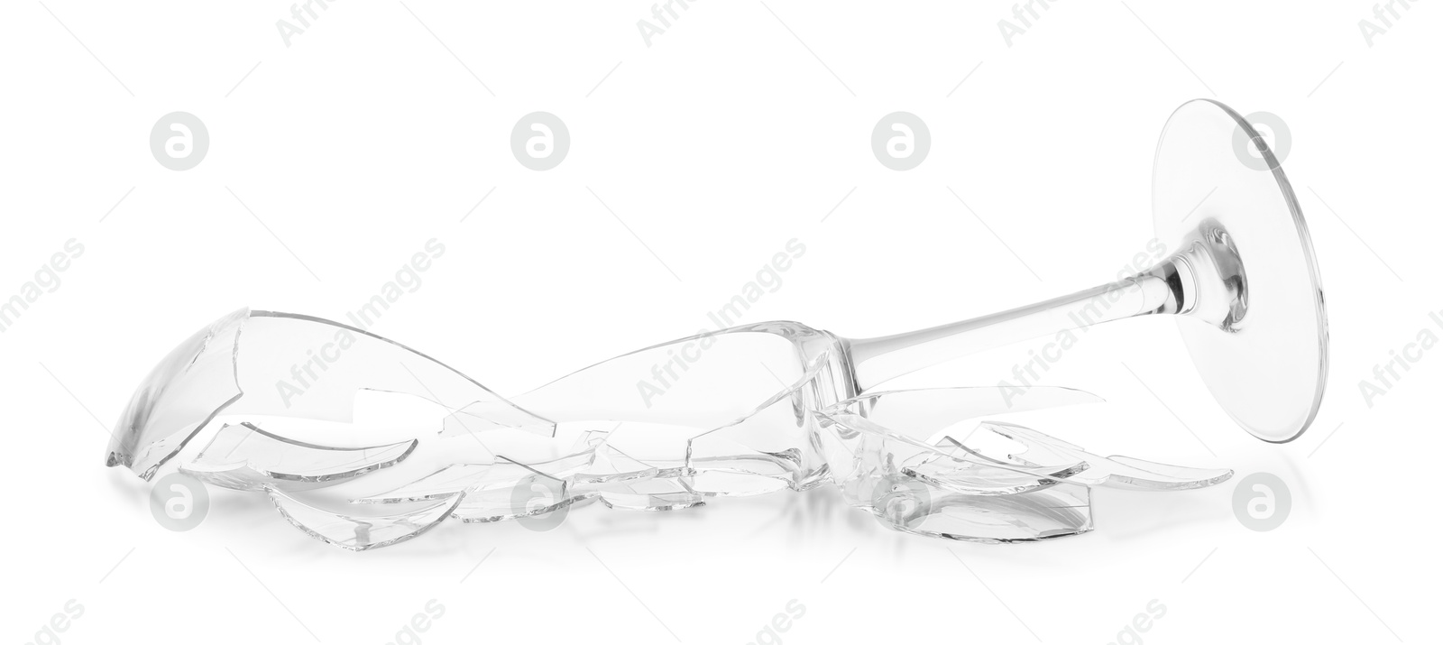 Photo of Pieces of broken wine glass isolated on white