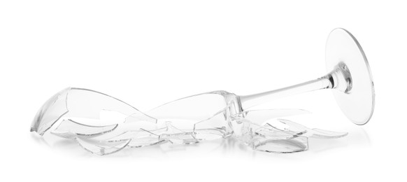 Photo of Pieces of broken wine glass isolated on white