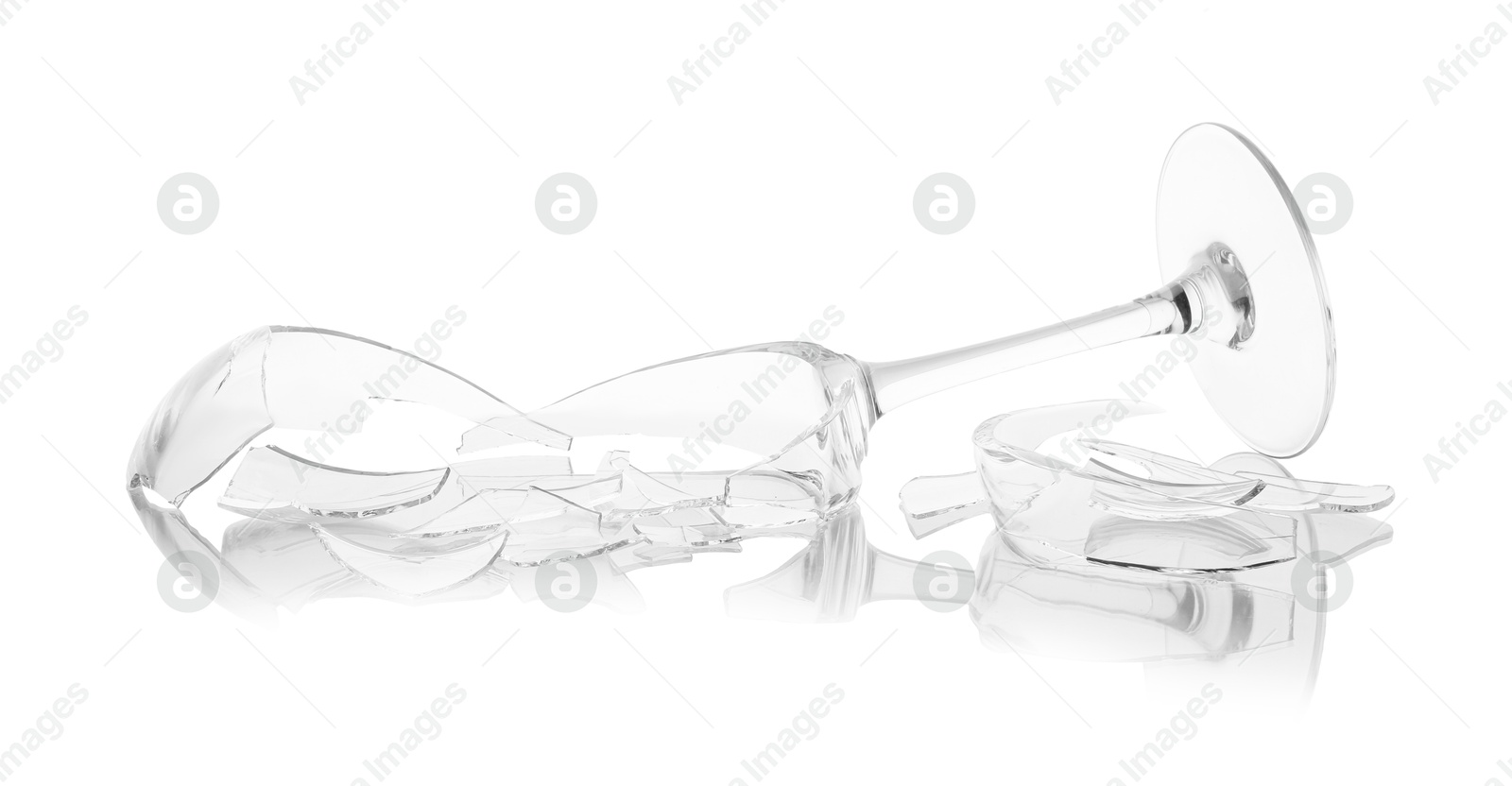 Photo of Pieces of broken wine glass isolated on white