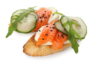 Photo of Delicious bruschette with cream cheese, salmon and cucumber isolated on white