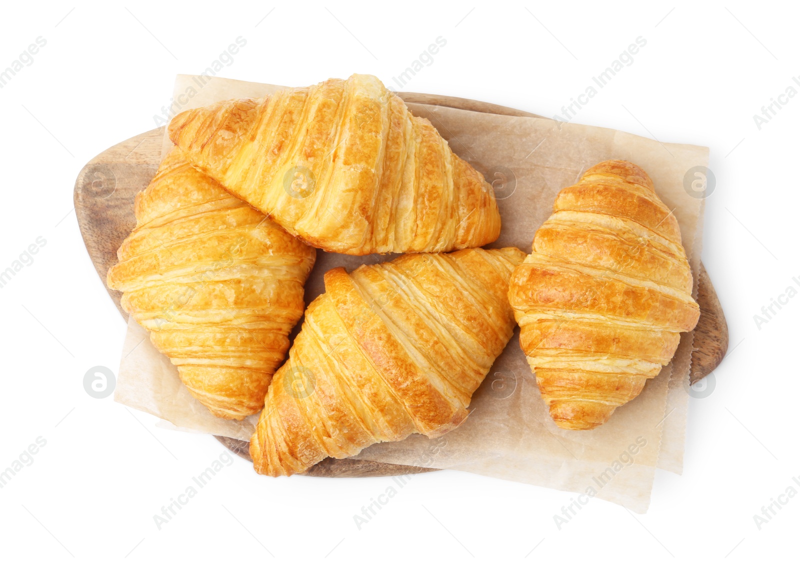 Photo of Tasty fresh croissants isolated on white, top view. Puff pastry