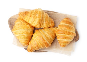 Photo of Tasty fresh croissants isolated on white, top view. Puff pastry