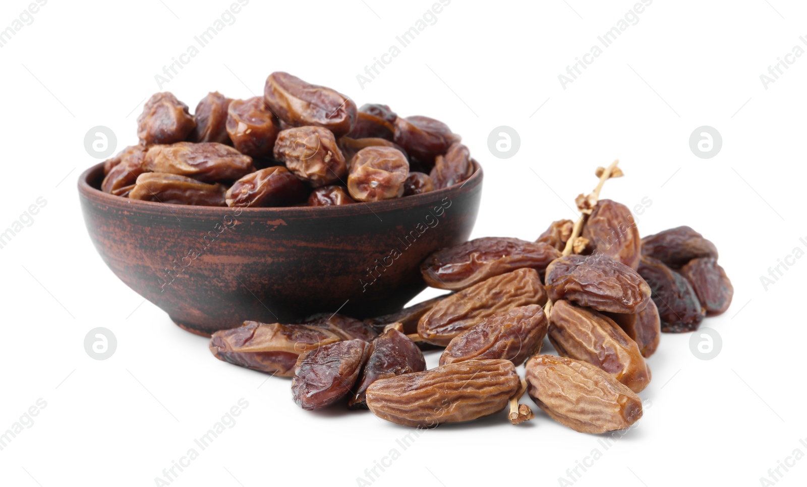 Photo of Bowl with tasty dried dates isolated on white