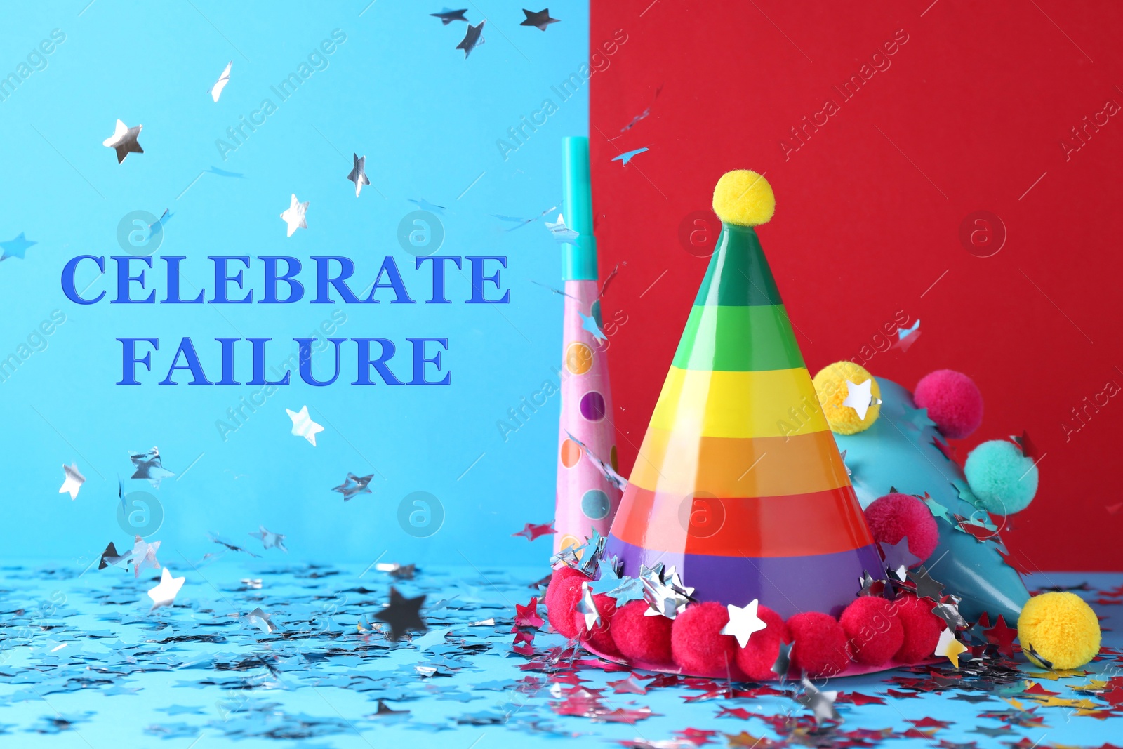 Image of Celebrate failure. Party hats and blower under confetti on light blue background