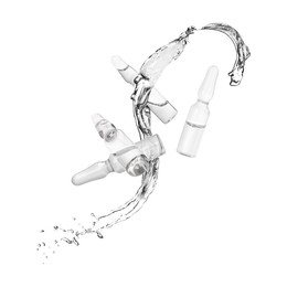 Image of Ampoules and splash of liquid in air on white background