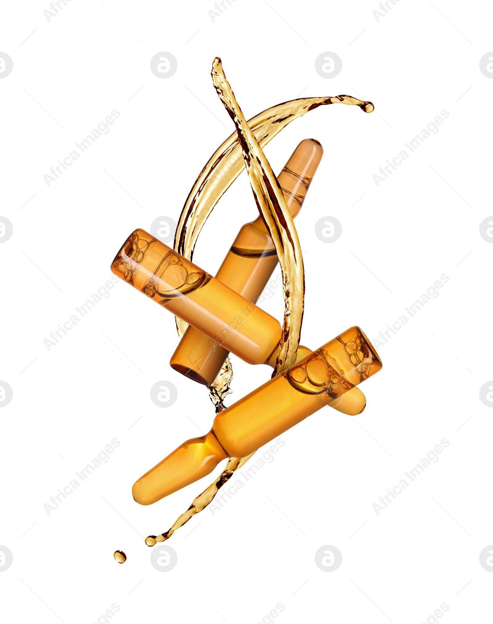 Image of Ampoules and splashing liquid in air on white background