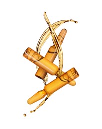 Image of Ampoules and splashing liquid in air on white background