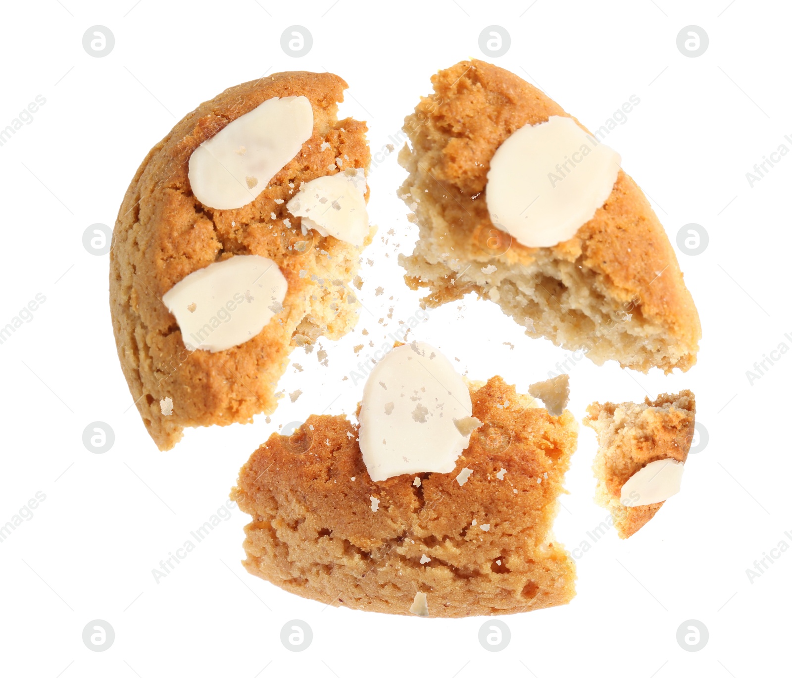 Image of Yummy nut cookie with almond petals in air on white background