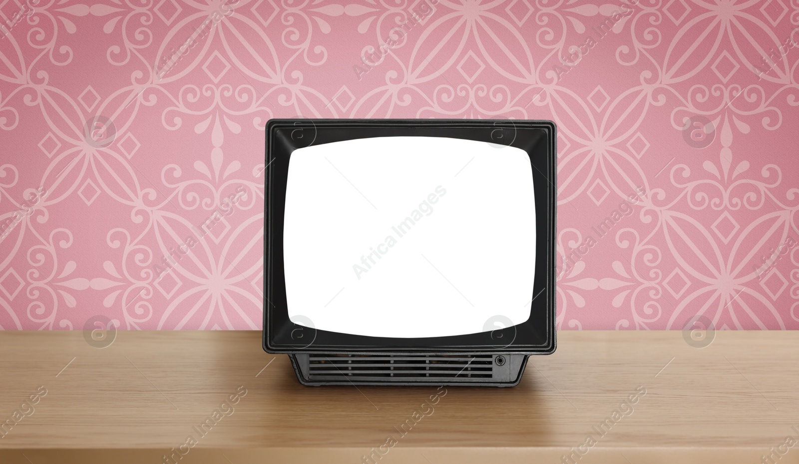 Image of Retro TV on wooden table near wall with vintage style wallpaper. Banner design