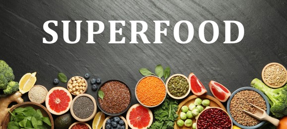 Image of Superfood. Different healthy food products on grey table, flat lay. Banner design