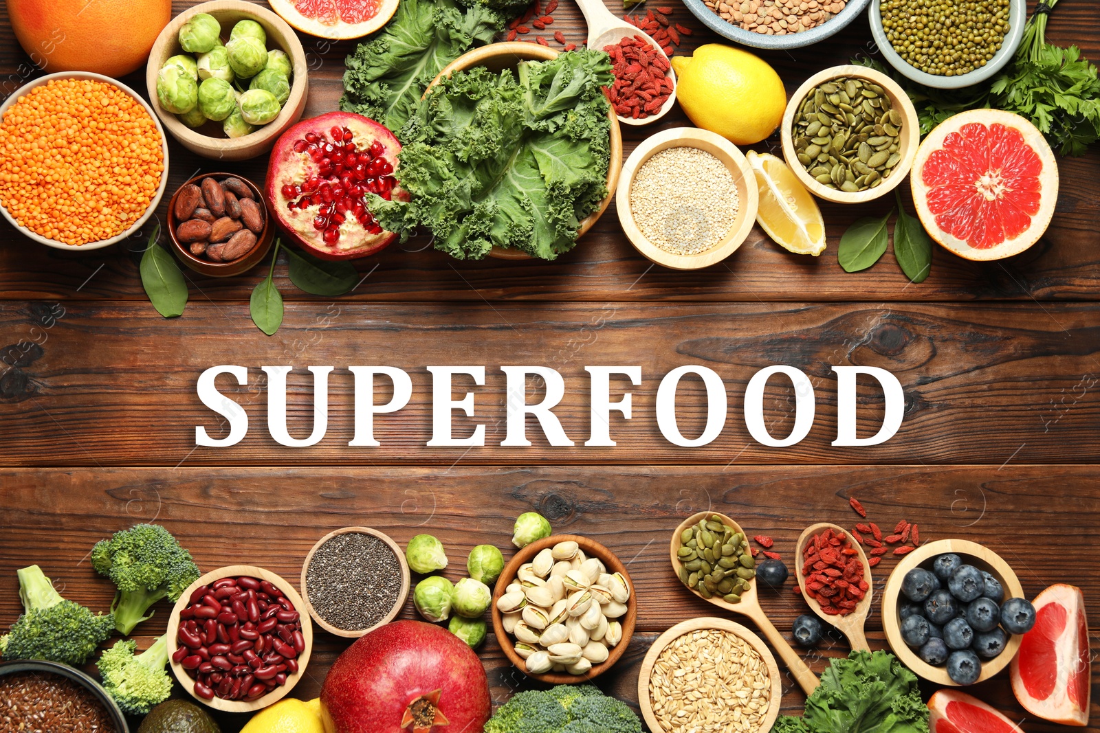 Image of Superfood. Different healthy food products on wooden table, flat lay