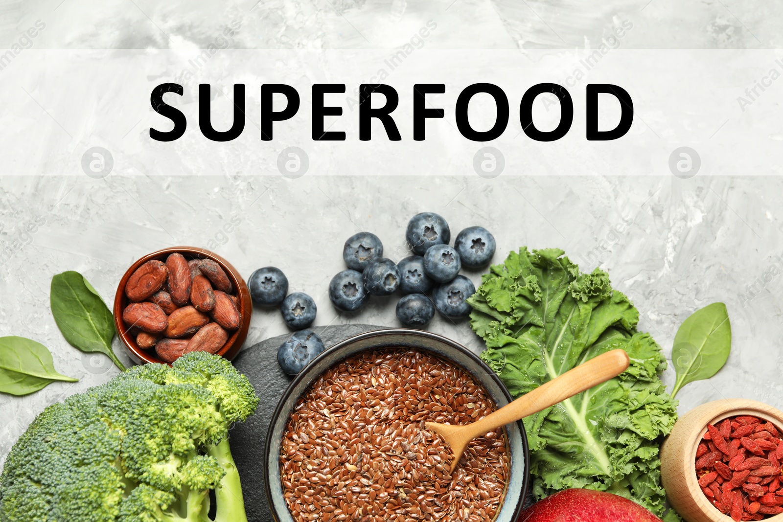 Image of Superfood. Different healthy food products on marble table, flat lay