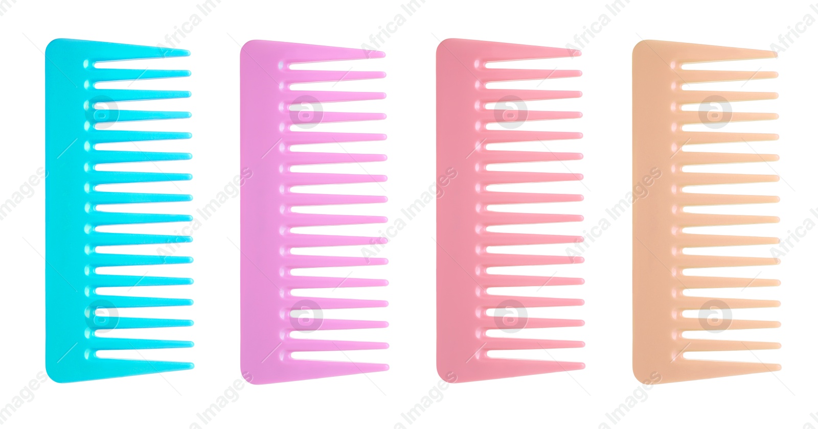 Image of Combs of different colors isolated on white