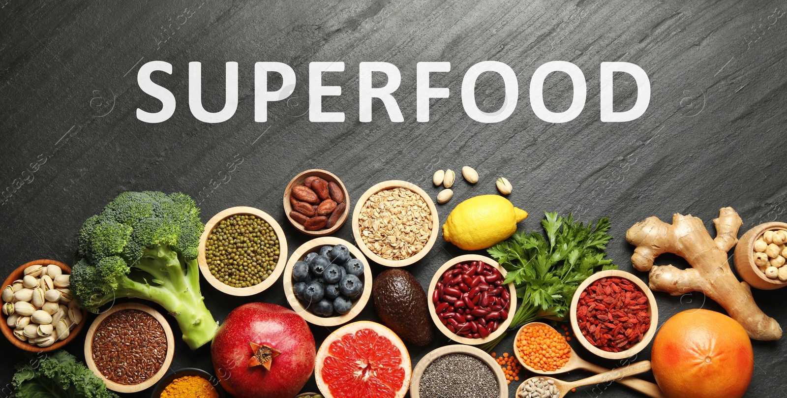 Image of Superfood. Different healthy food products on grey table, flat lay. Banner design