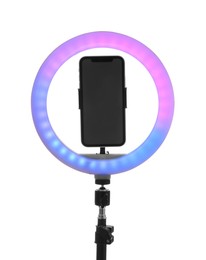 Photo of Tripod with ring light and smartphone isolated on white