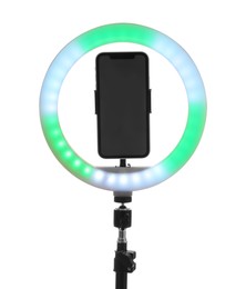 Photo of Tripod with ring light and smartphone isolated on white