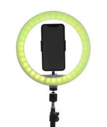 Photo of Tripod with ring light and smartphone isolated on white