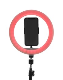 Photo of Tripod with ring light and smartphone isolated on white