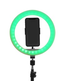 Photo of Tripod with ring light and smartphone isolated on white